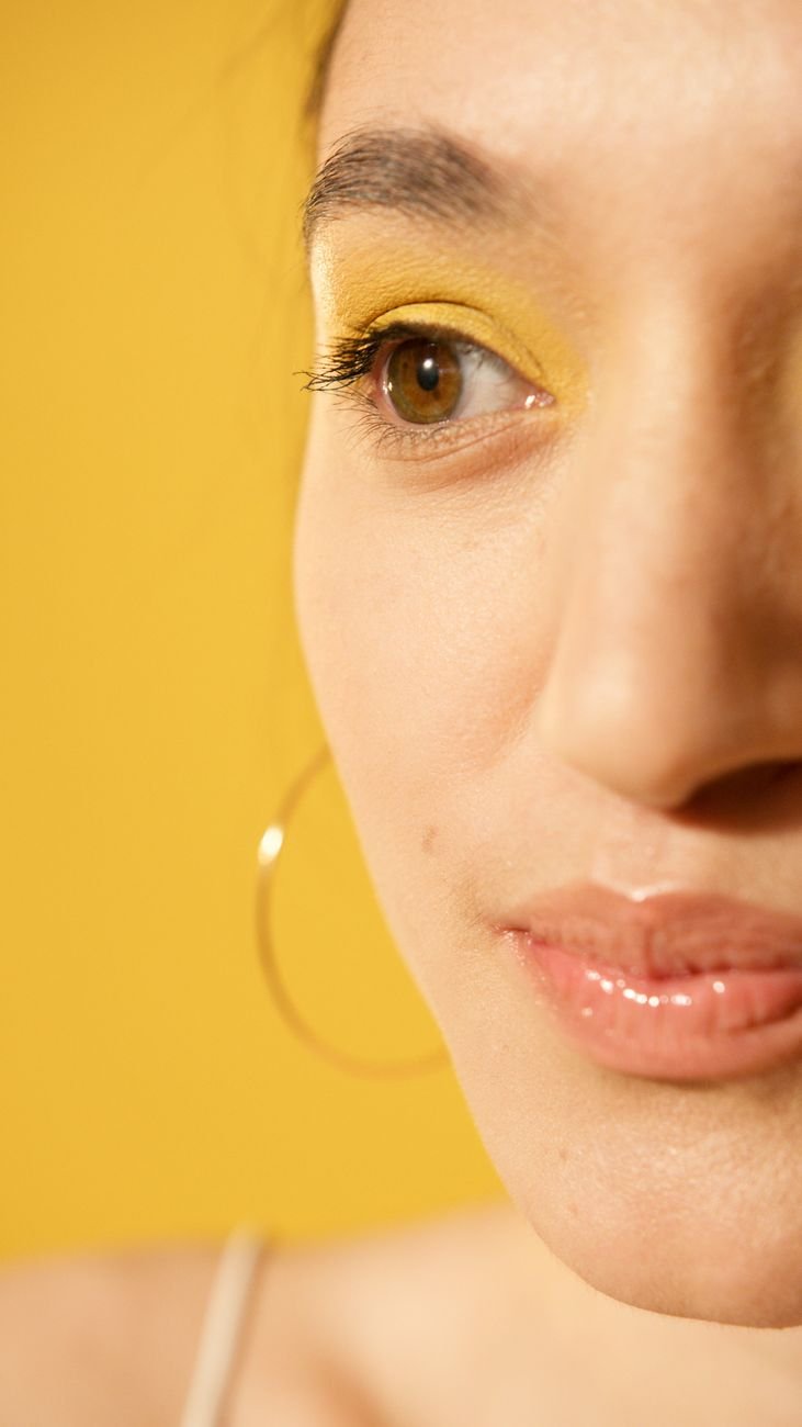 a woman wearing hoop earring